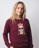 gravisk Crowned graphic sweatshirt in organic cotton. Cream and burgundy portrait with dark sunglasses and a geometric crown.