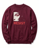 gravisk Resist v1 graphic sweatshirt in organic cotton. Half a face with one open eye, red lashes and the word resist in worn red.