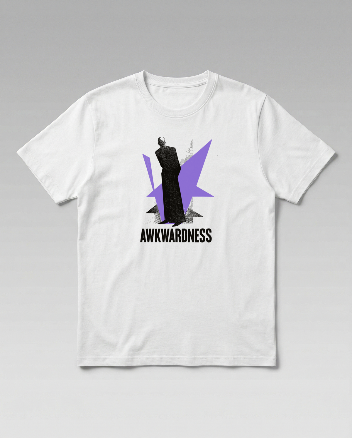gravisk Awkwardness organic graphic tee. A dark figure in front of a lavender starburst, AWKWARDNESS in black caps below.