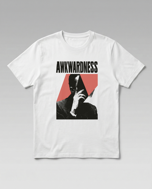 gravisk Awkwardness organic graphic tee. Heavy gothic type, a hand over the face, a red diamond cutting through.