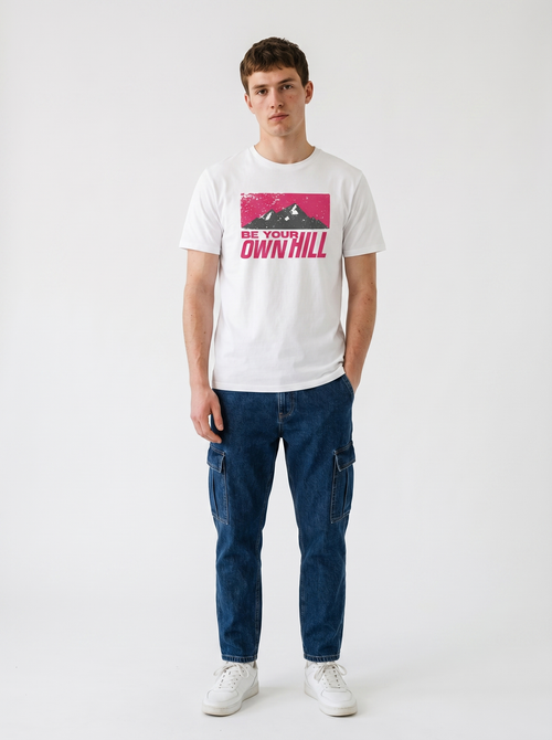 gravisk Be Your Own Hill organic graphic tee. A dark mountain range in a worn magenta field: not the peak, the whole hill.