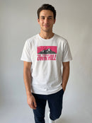 gravisk Be Your Own Hill organic graphic tee. A dark mountain range in a worn magenta field: not the peak, the whole hill.