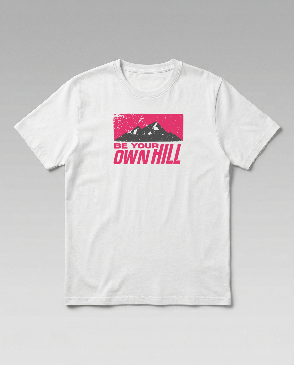 gravisk Be Your Own Hill organic graphic tee. A dark mountain range in a worn magenta field: not the peak, the whole hill.