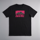 gravisk Be Your Own Hill organic graphic tee. A dark mountain range in a worn magenta field: not the peak, the whole hill.