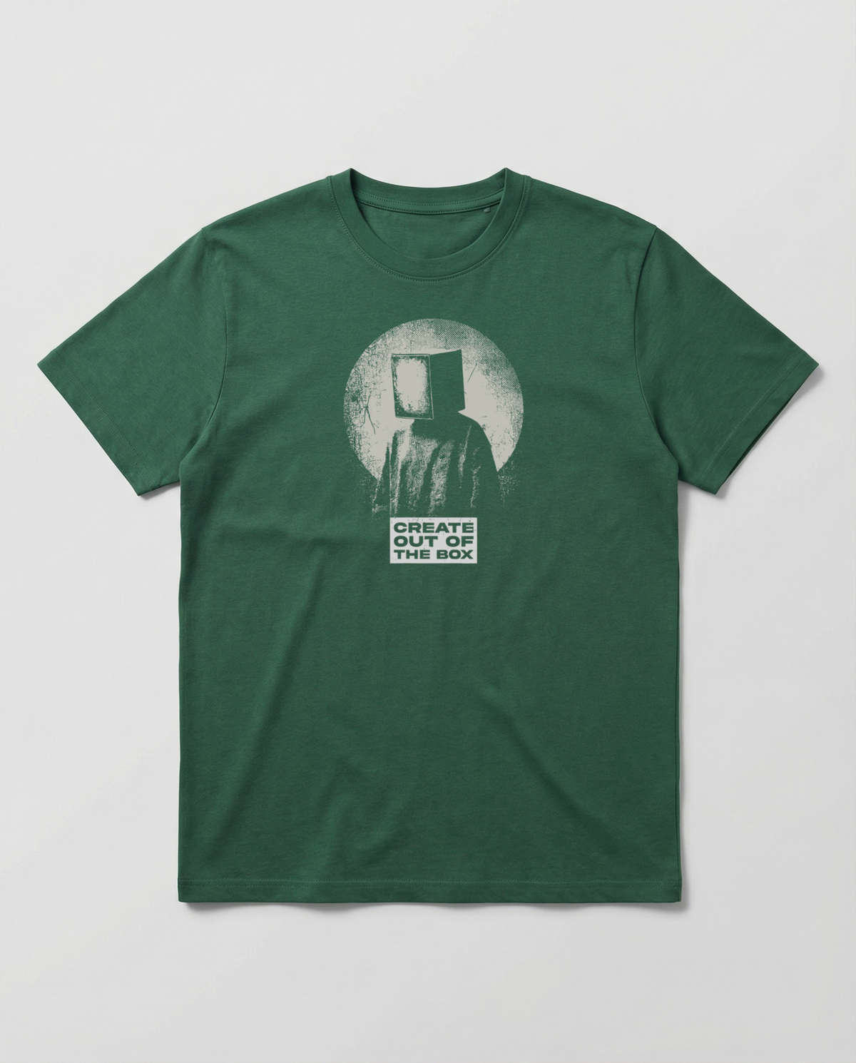 gravisk Create Out Of The Box organic graphic tee. Surreal stipple-art silhouette with a box for a head, under a full moon.