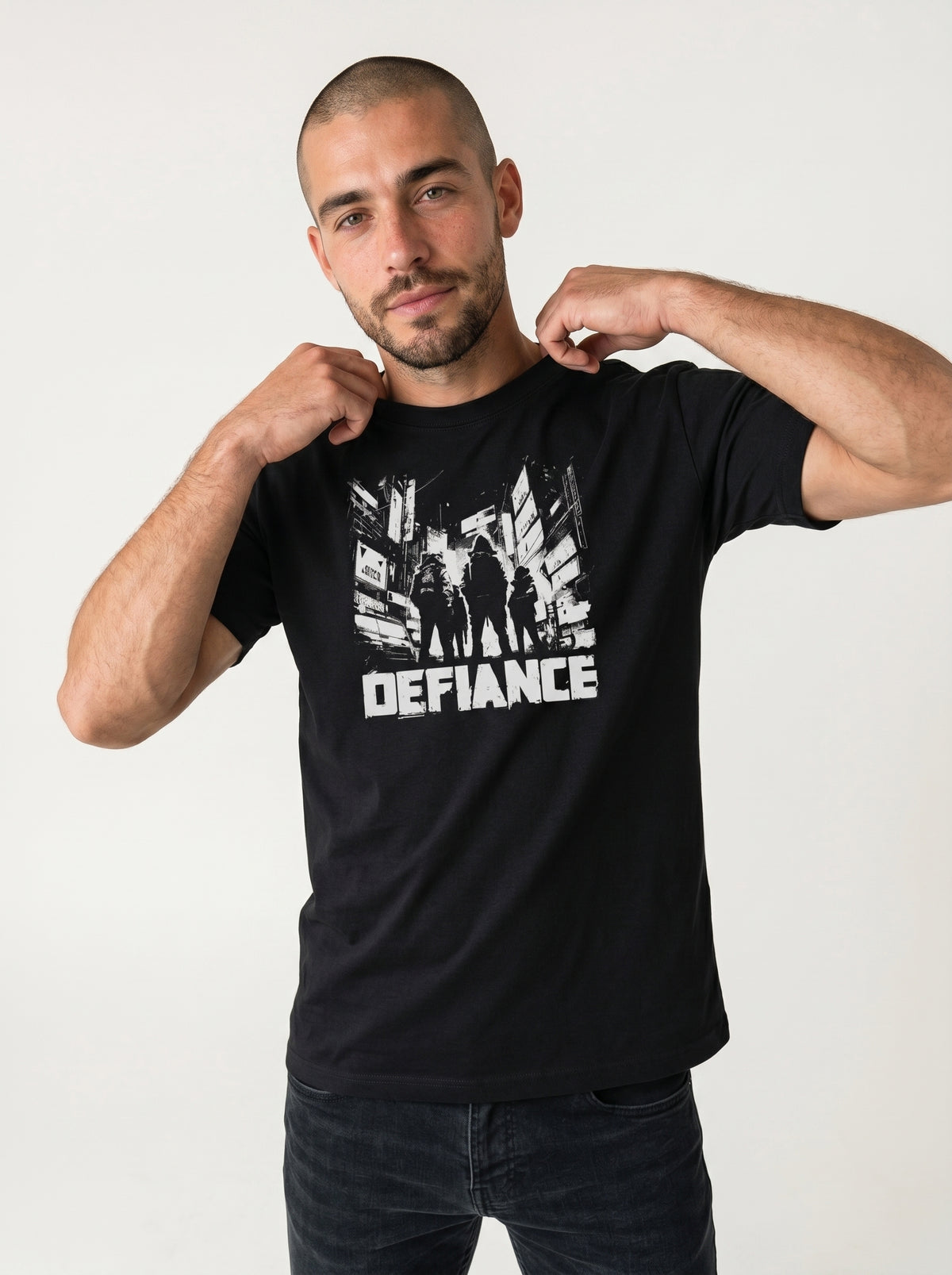 gravisk Defiance organic graphic tee. High-contrast scene of four figures standing their ground in urban ruins.