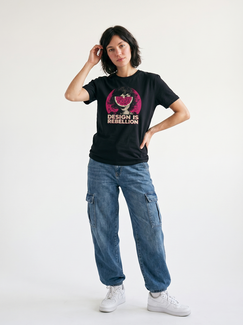 gravisk Design Is Rebellion organic graphic tee. Half-tone portrait with a watermelon mask in a magenta circle.