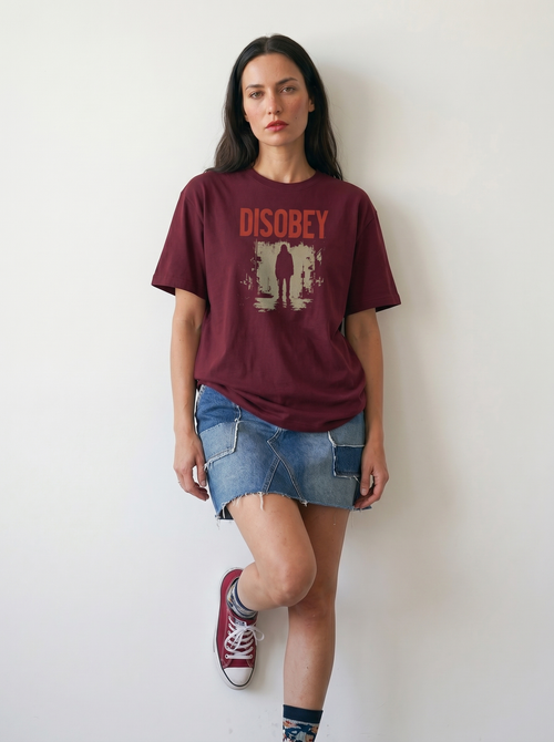 gravisk Disobey organic graphic tee. Distressed red DISOBEY type over a lone figure in an empty street.