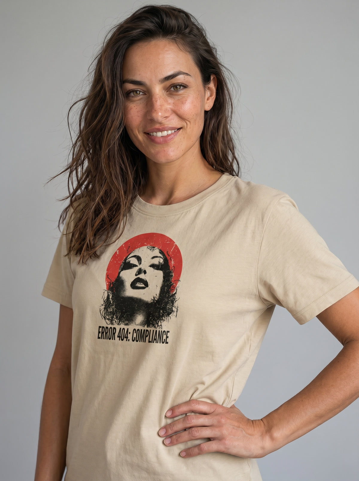 gravisk Error 404: Compliance organic graphic tee. Distressed portrait in a red circle, monospace ERROR 404: COMPLIANCE type.