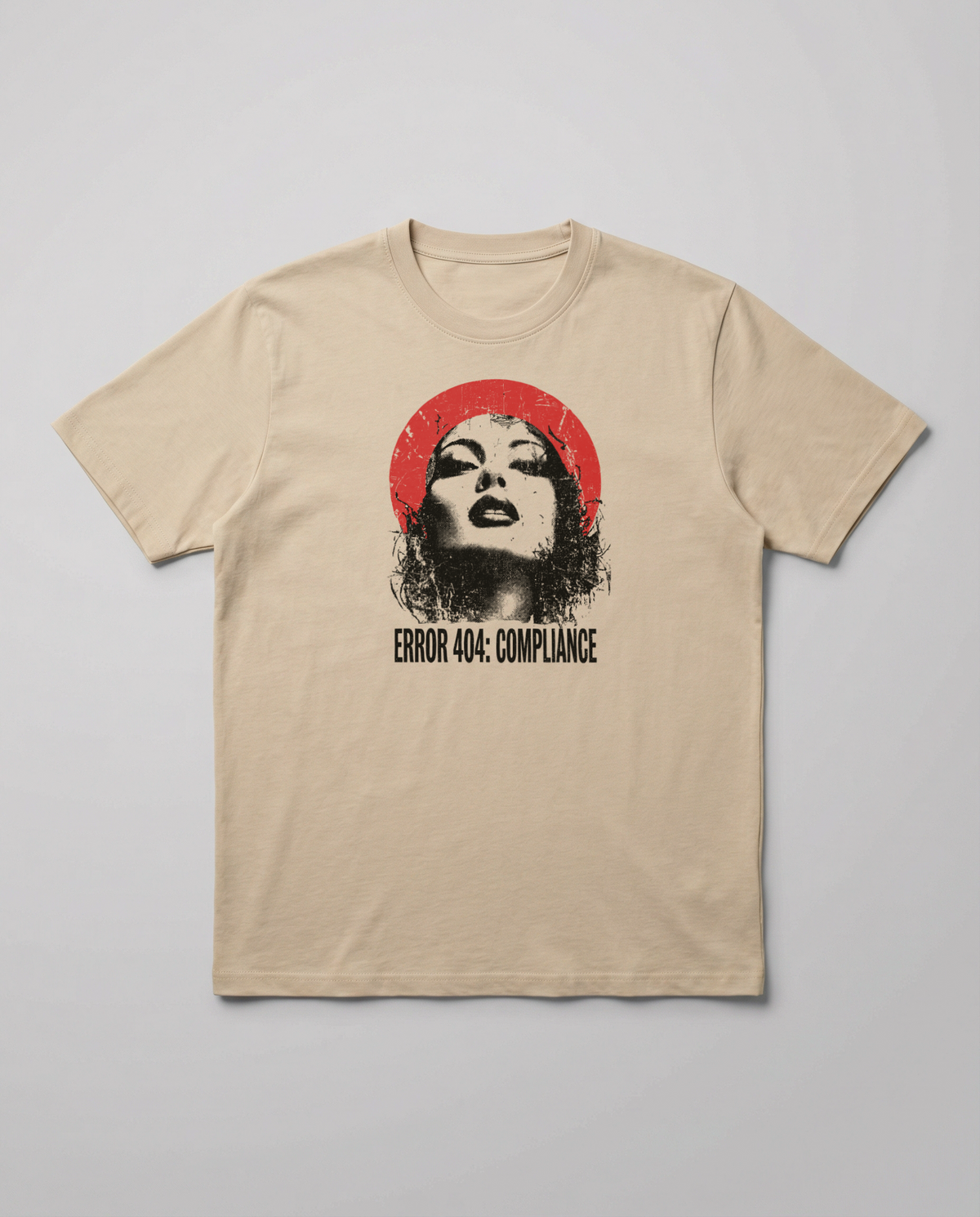 gravisk Error 404: Compliance organic graphic tee. Distressed portrait in a red circle, monospace ERROR 404: COMPLIANCE type.