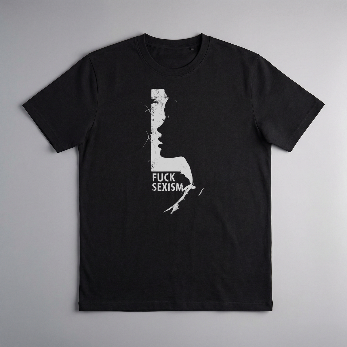 gravisk F*ck Sexism organic graphic tee. Distressed white profile silhouette with FUCK SEXISM set inside it.