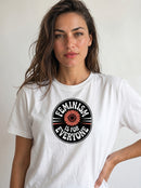gravisk Feminism Is for Everyone organic graphic tee. Circular emblem with a coral flower and curved FEMINISM IS FOR EVERYONE type.