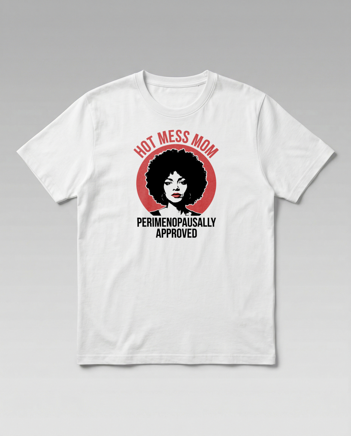 gravisk Hot Mess Mom organic graphic tee. Retro pop-art badge, a portrait in a red circle, PERIMENOPAUSALLY APPROVED.