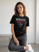 gravisk Introvert organic graphic tee. A face dissolving into grain, a red scribble across the eyes.