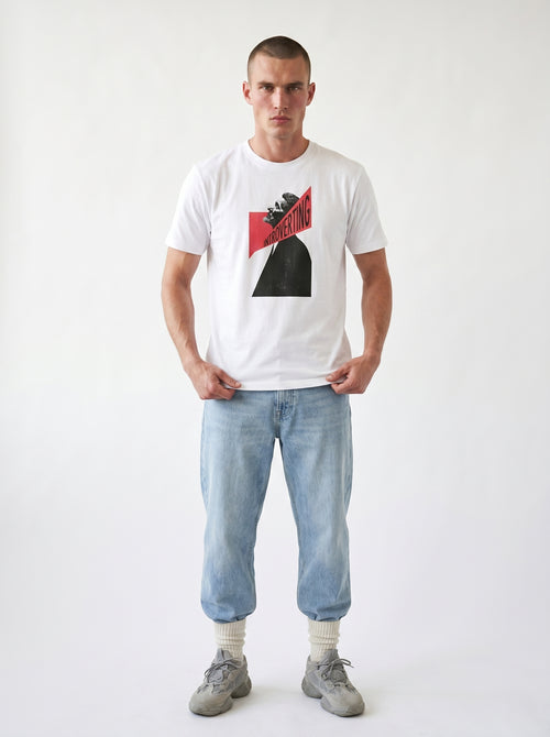 gravisk Introverting organic graphic tee. A tilted profile portrait cut by a red diagonal band reading INTROVERTING.