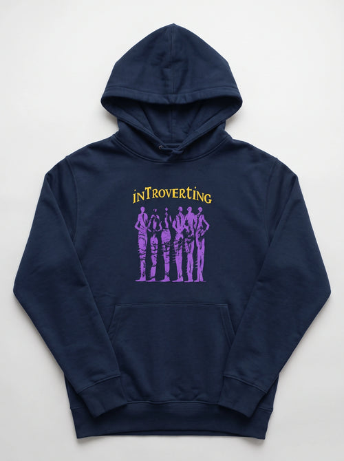 gravisk Introverting v2 graphic hoodie in organic cotton. Six tall purple figures drawn in restless strokes under yellow lettering.