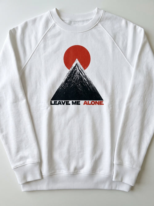 gravisk Leave Me Alone graphic sweatshirt in organic cotton. Minimal mountain with the sun behind it and the words leave me alone.