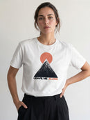 gravisk Leave Me Alone organic graphic tee. Hand-drawn mountain under a red sun, ALONE in red.