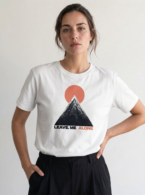 gravisk Leave Me Alone organic graphic tee. Hand-drawn mountain under a red sun, ALONE in red.