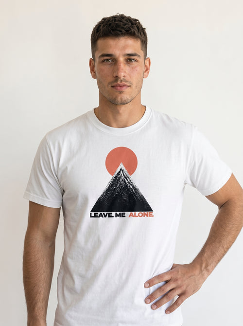 gravisk Leave Me Alone organic graphic tee. Hand-drawn mountain under a red sun, ALONE in red.