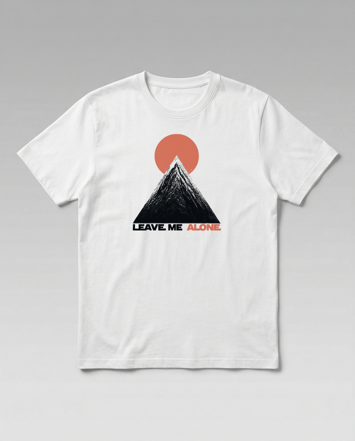 gravisk Leave Me Alone organic graphic tee. Hand-drawn mountain under a red sun, ALONE in red.