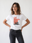 gravisk Let Gravity Guide You organic graphic tee. Stacked rust-red type over four small figures on an ink horizon.