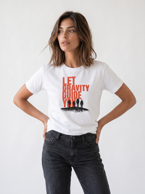 gravisk Let Gravity Guide You organic graphic tee. Stacked rust-red type over four small figures on an ink horizon.