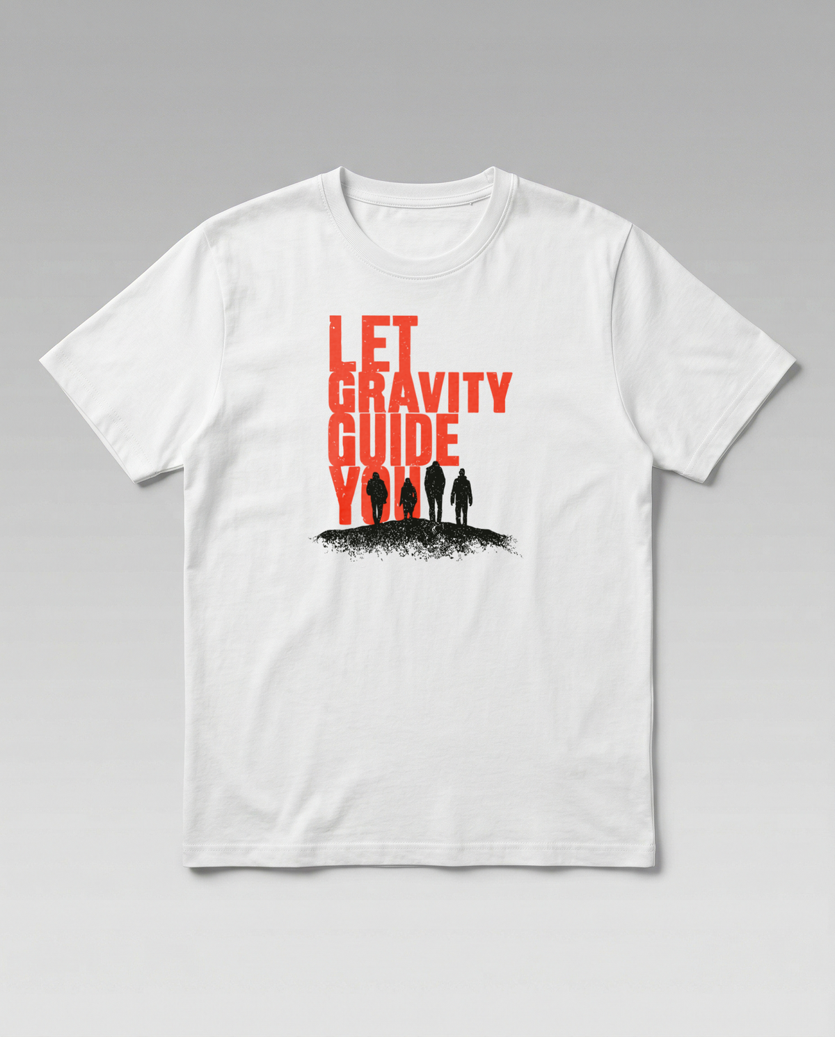 gravisk Let Gravity Guide You organic graphic tee. Stacked rust-red type over four small figures on an ink horizon.