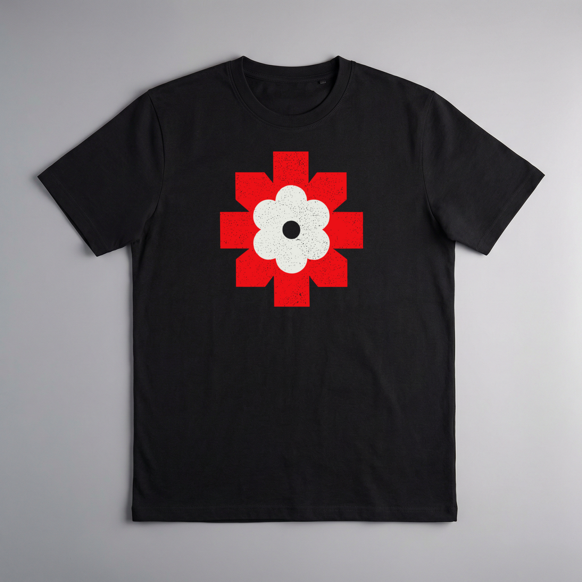gravisk Lichen Bloom organic graphic tee. Bold red geometric emblem framing a white flower.