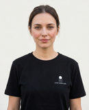 gravisk Love Minimalism organic graphic tee. Small chest print: an architectural icon above LOVE MINIMALISM lettering.