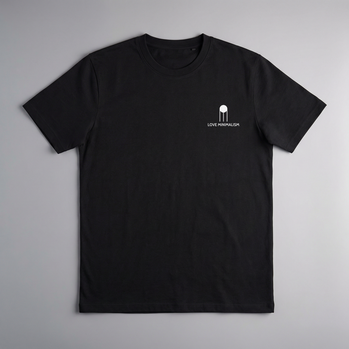 gravisk Love Minimalism organic graphic tee. Small chest print: an architectural icon above LOVE MINIMALISM lettering.