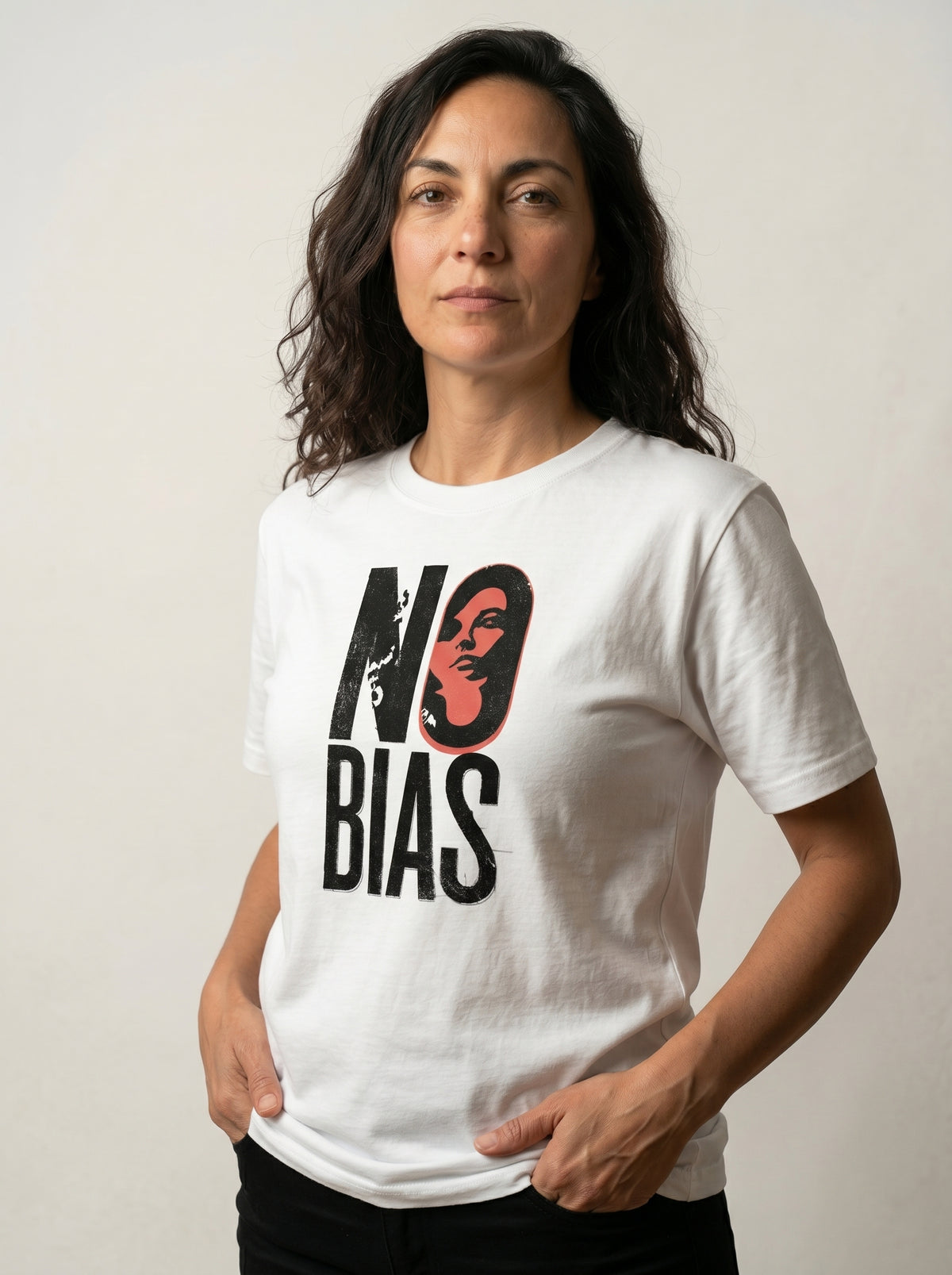 gravisk No Bias organic graphic tee. Heavy serif NO BIAS with a terracotta portrait inside the letter O.