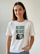 gravisk No Gods No Guns organic graphic tee. Distressed green stencil type over a half-tone portrait.