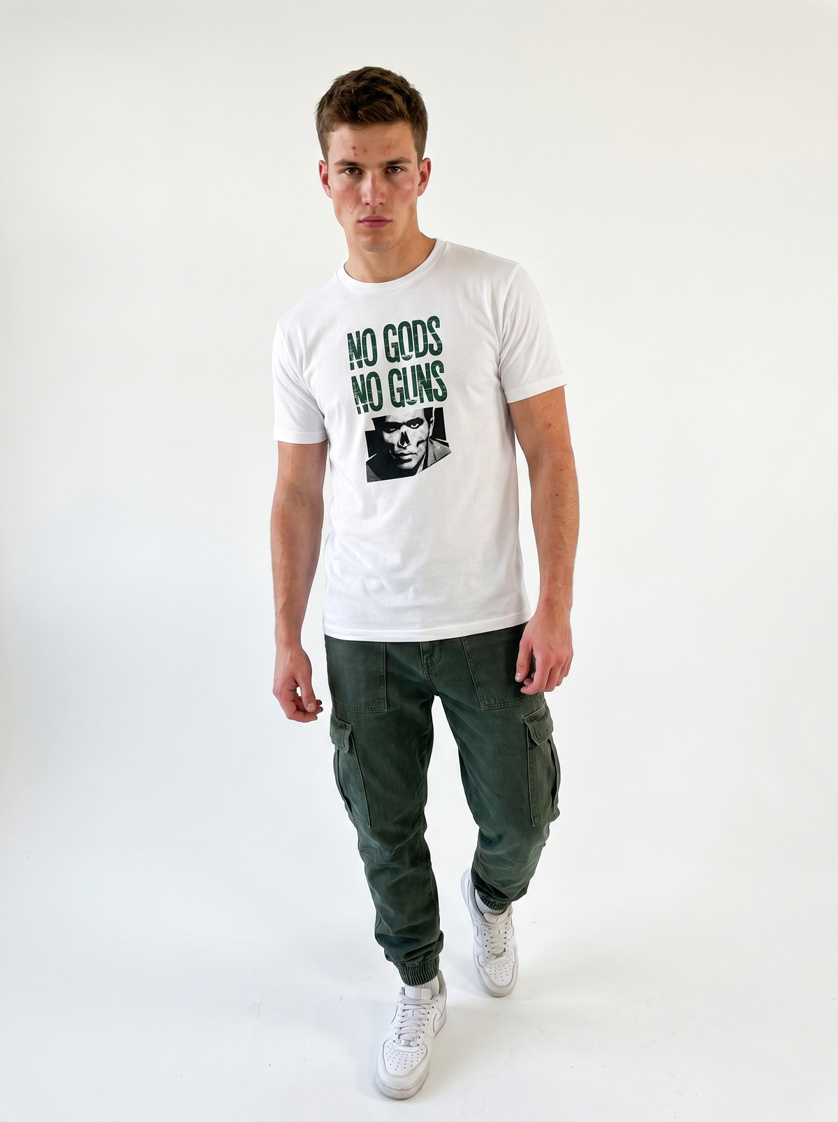 gravisk No Gods No Guns organic graphic tee. Distressed green stencil type over a half-tone portrait.