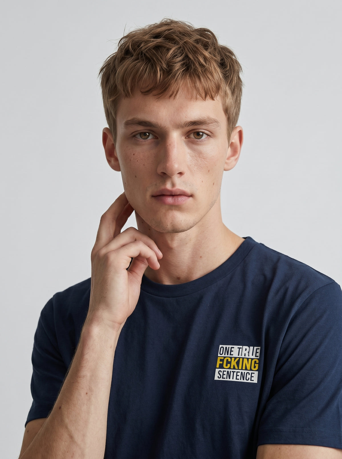 gravisk One True Fcking Sentence organic graphic tee. Small bordered chest print reading ONE TRUE FCKING SENTENCE.