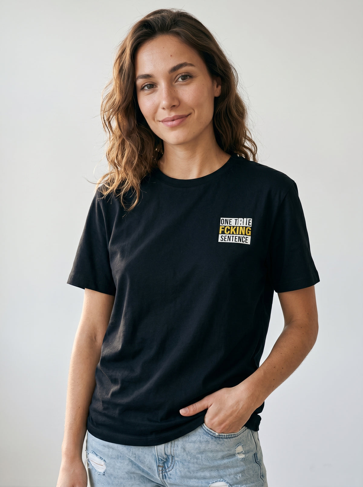 gravisk One True Fcking Sentence organic graphic tee. Small bordered chest print reading ONE TRUE FCKING SENTENCE.