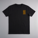 gravisk Own Your Chaos organic graphic tee. Compact amber chest print framed in thin bars.