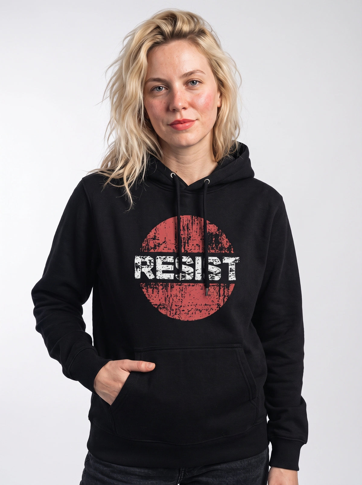 gravisk Resist graphic hoodie in organic cotton. RESIST in cracked white letters across a faded red circle.