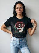 gravisk Resist organic graphic tee. Pop-art portrait with pomegranate lenses, distressed red RESIST above.