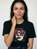 gravisk Resist organic graphic tee. Pop-art portrait with pomegranate lenses, distressed red RESIST above.