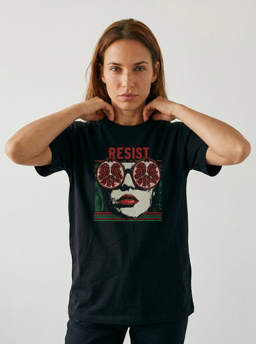 gravisk Resist organic graphic tee. Pop-art portrait with pomegranate lenses, distressed red RESIST above.