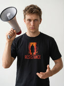 gravisk Resistance organic graphic tee. A silhouette in a burning orange doorway, RESISTANCE in red below.