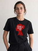 gravisk Stand Up Speak Out organic graphic tee. Red female head silhouette with STAND UP SPEAK OUT inside.