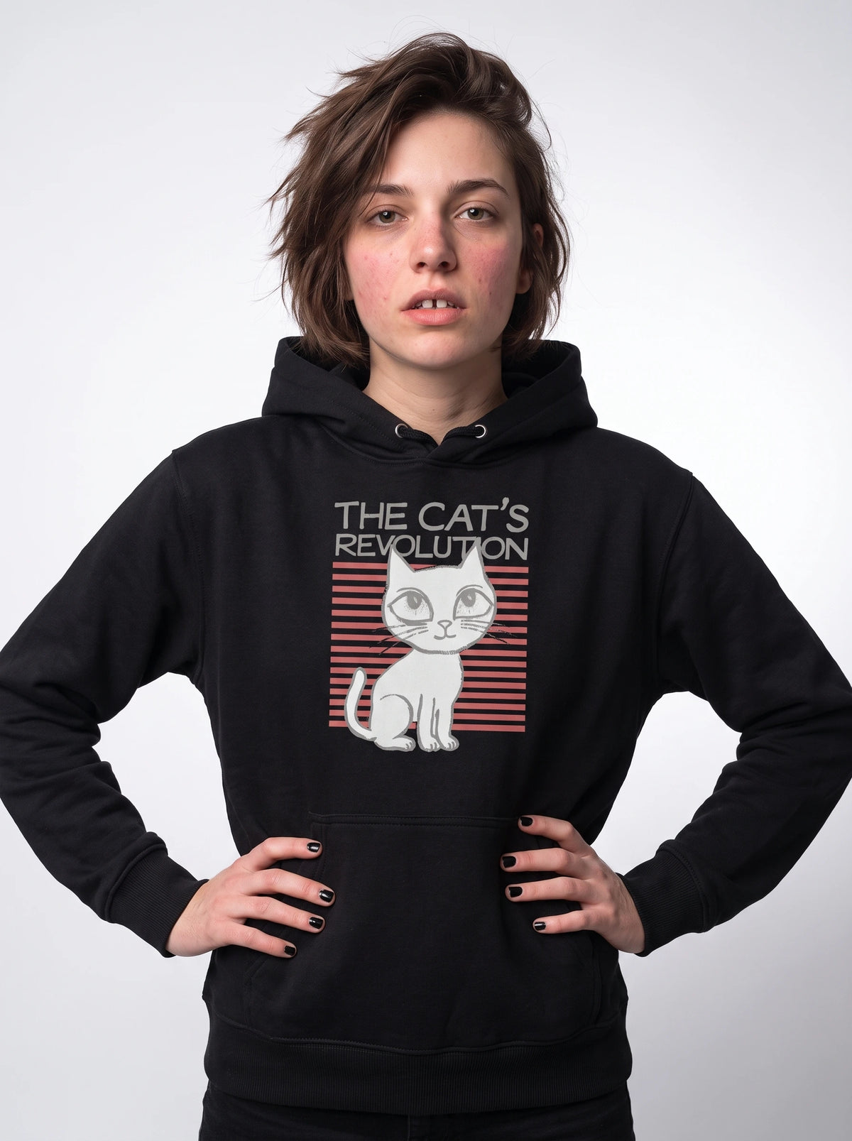 gravisk The Cat's Revolution graphic hoodie in organic cotton. Wide-eyed white cat over coral stripes with retro lettering.