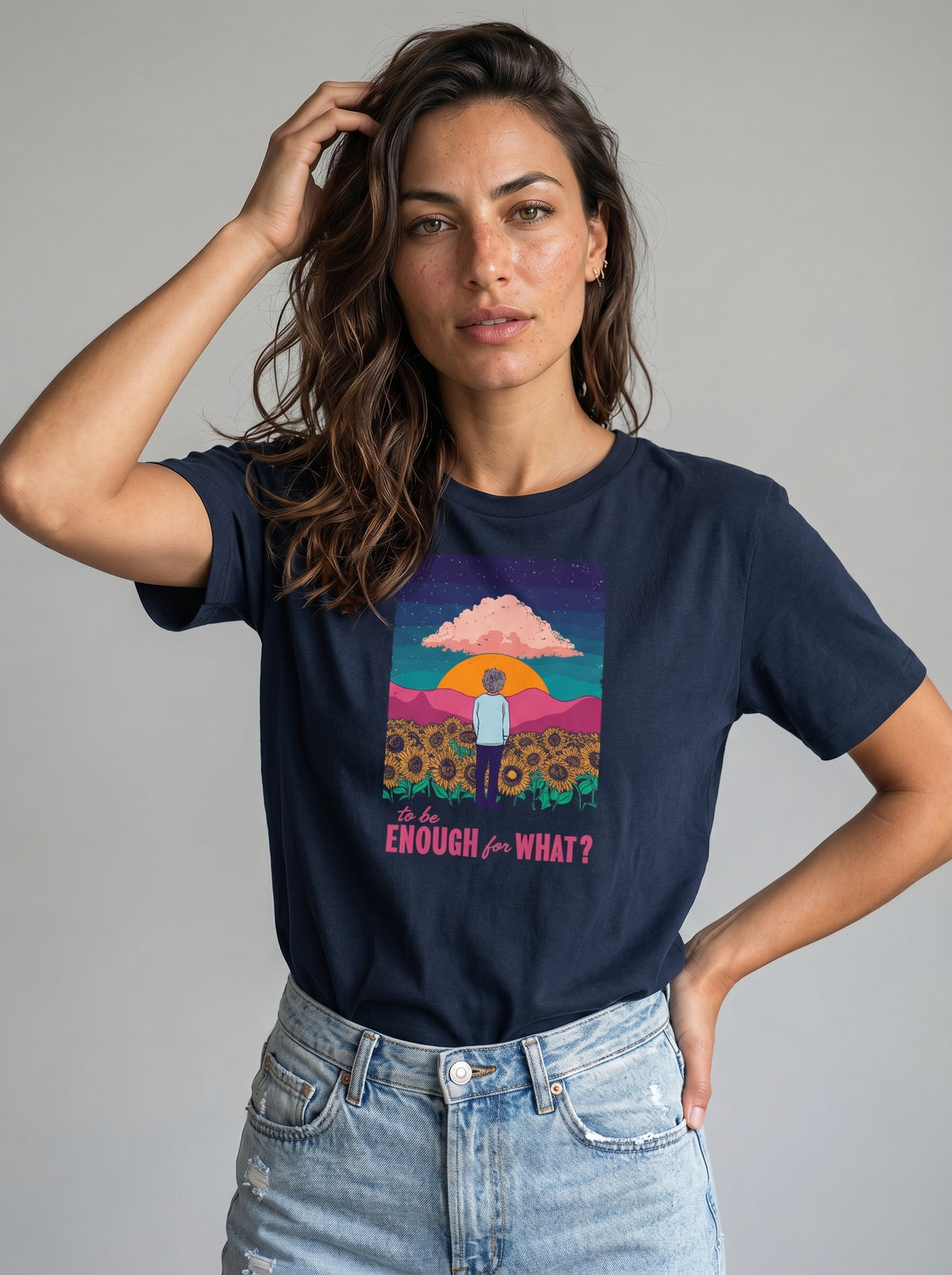 gravisk To Be Enough for What? organic graphic tee. A lone figure in a sunflower field at sunset, TO BE ENOUGH FOR WHAT?