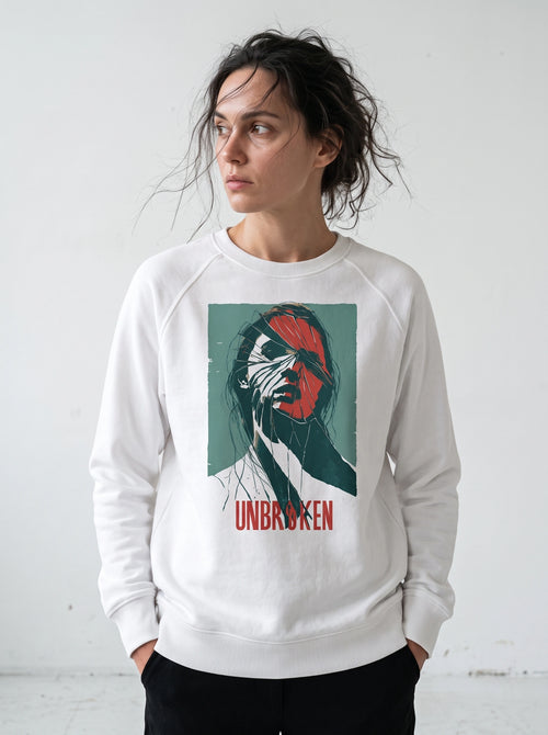 gravisk Unbroken graphic sweatshirt in organic cotton. Portrait split like shattered glass in teal and red with the word unbroken.