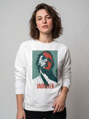 gravisk Unbroken graphic sweatshirt in organic cotton. Portrait split like shattered glass in teal and red with the word unbroken.