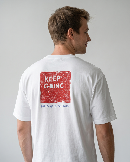 gravisk Wake Up organic graphic tee. Small WAKE UP chest print, large KEEP GOING red square on the back.