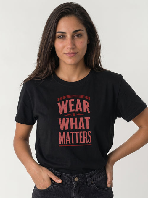 gravisk Wear What Matters organic graphic tee. WEAR WHAT MATTERS in worn red capitals between thin rules.