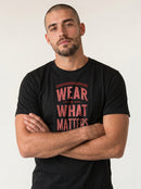 gravisk Wear What Matters organic graphic tee. WEAR WHAT MATTERS in worn red capitals between thin rules.